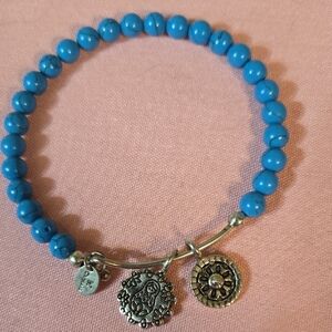 Turquoise Beaded Bracelet with Silver Charms